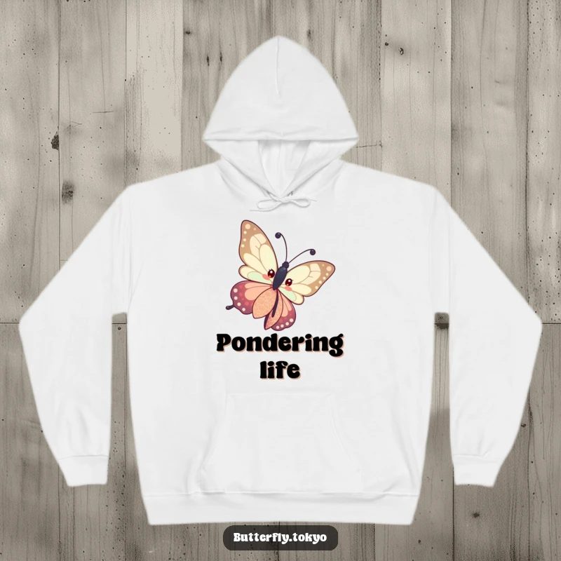 Funny Butterfly Patterned Kimono Hoodie showing a butterfly curiously tilting its head in a patterned kimono, offering warmth and contemplation.